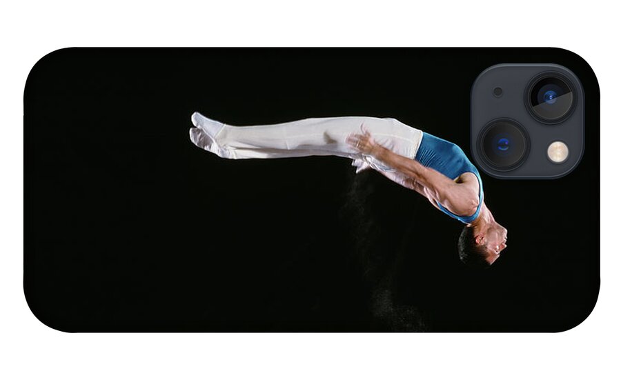 One Man Only iPhone 13 Case featuring the photograph Male Gymnast Performing On Parallel Bars by David Madison