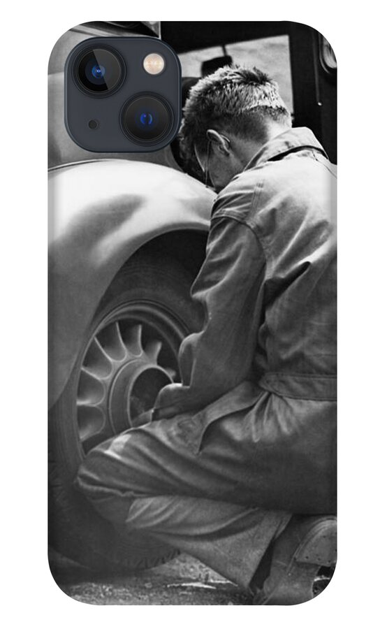 Working iPhone 13 Case featuring the photograph Mechanic Changing Tire On Car by George Marks