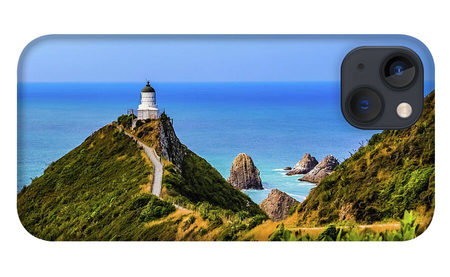 Lighthouse iPhone 13 Case featuring the photograph Nugget Point lighthouse, New Zealand by Lyl Dil Creations