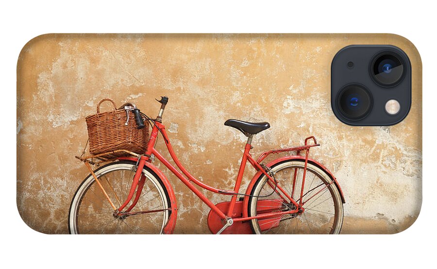 Leaning iPhone 13 Case featuring the photograph Old Red Bike Against A Yellow Wall In by Romaoslo