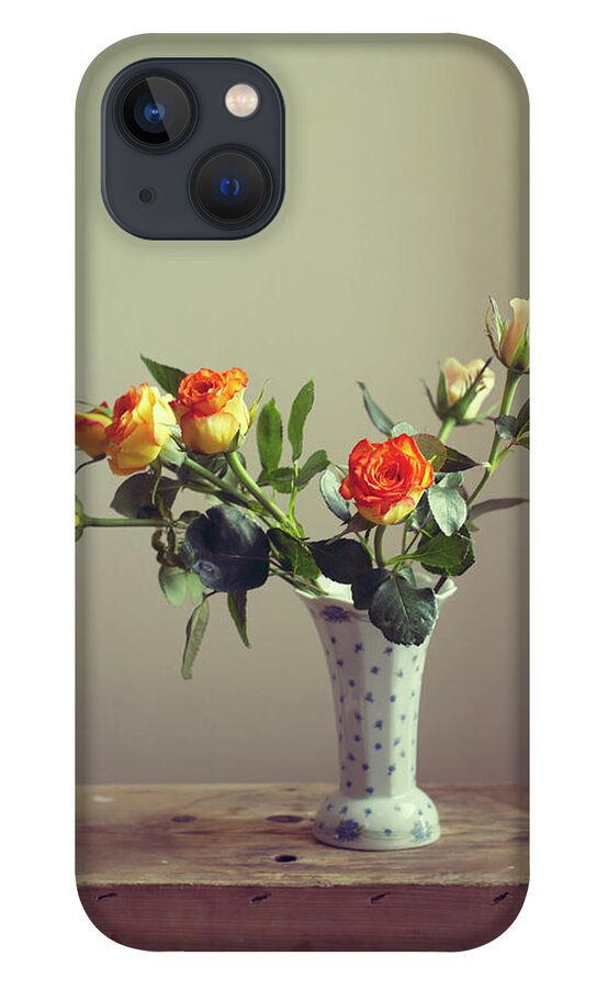 Orange Color iPhone 13 Case featuring the photograph Orange Roses In Vintage Vase by Copyright Anna Nemoy(xaomena)