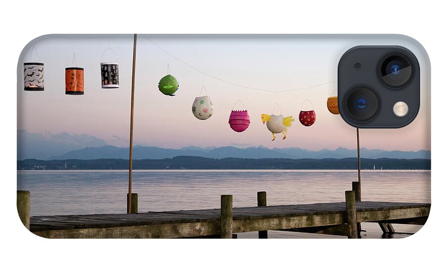 Tranquility iPhone 13 Case featuring the photograph Paper Lanterns Strung Up On Wooden Pier by Henglein And Steets