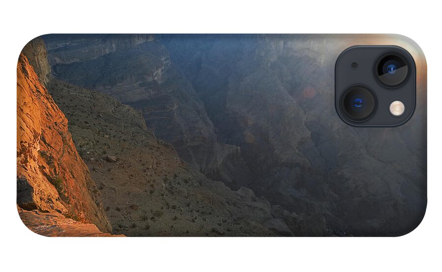 Scenics iPhone 13 Case featuring the photograph Sunrise Over Canyon, Oman by Franz Aberham