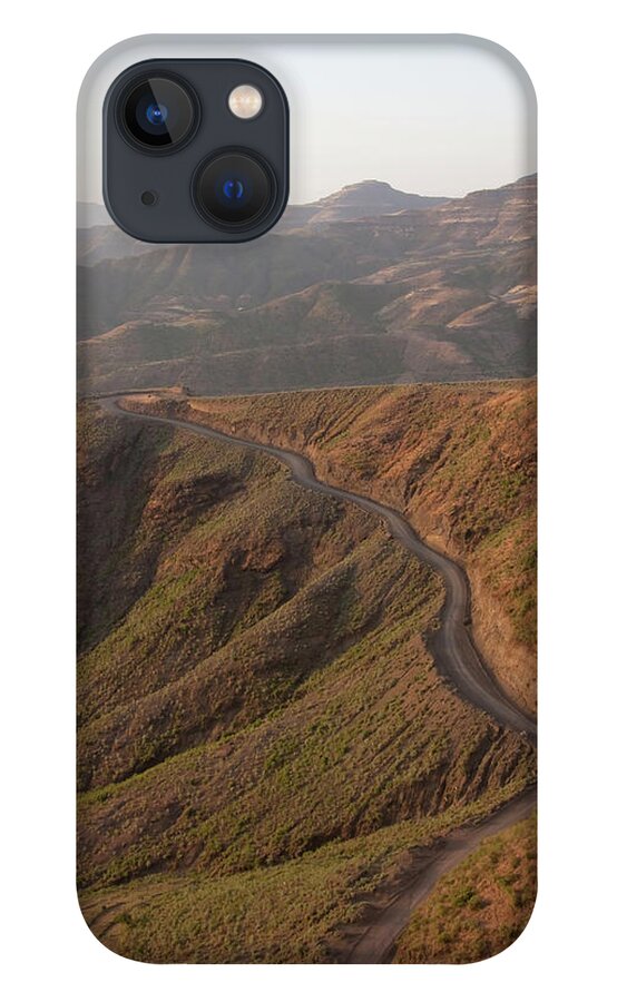 Extreme Terrain iPhone 13 Case featuring the photograph Sunset Lights The Rugged Mountain Pass by Mike Copeland