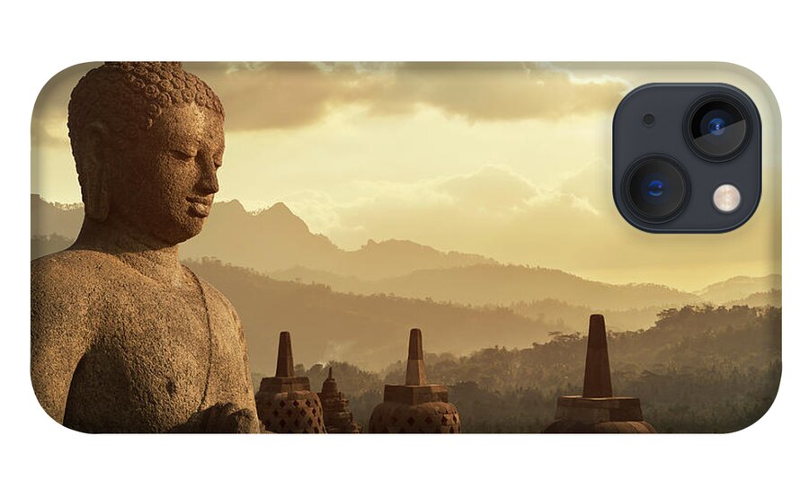 Tranquility iPhone 13 Case featuring the photograph Sunset Over Buddha Statue In Borobudur by Buena Vista Images