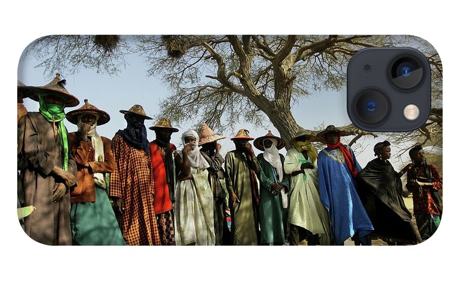 Young Men iPhone 13 Case featuring the photograph Wodaabe Men Standing Under A Desert Tree by Timothy Allen