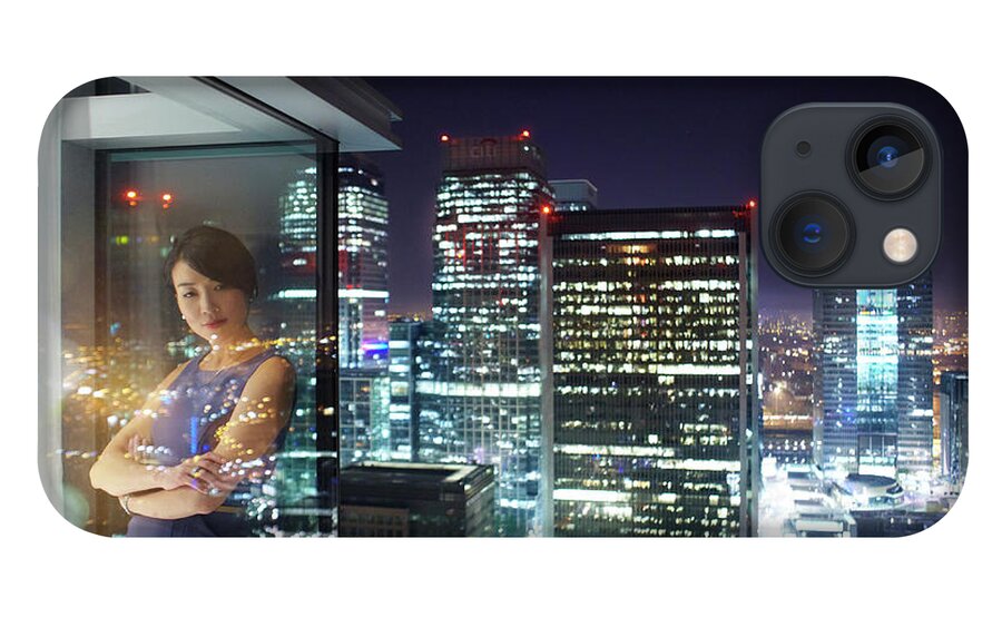 Corporate Business iPhone 13 Case featuring the photograph Woman In City Apartment At Night by Michael Blann