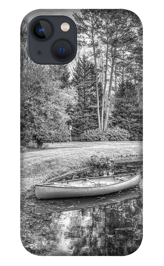 Boats iPhone 13 Case featuring the photograph Canoe on the Edge of the Lake in Black and White #1 by Debra and Dave Vanderlaan