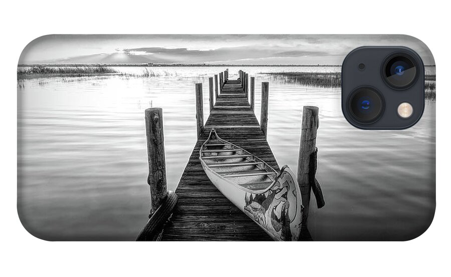 Black iPhone 13 Case featuring the photograph Canoe on the Dock Black and White by Debra and Dave Vanderlaan