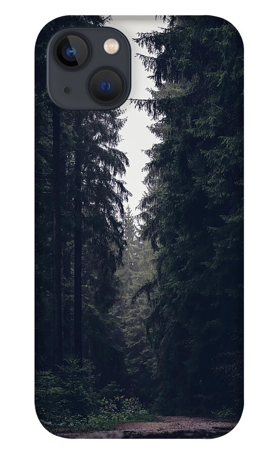 Forest iPhone 13 Case featuring the photograph Dark atmosphere in forest. Forgotten road in rainy day by Vaclav Sonnek