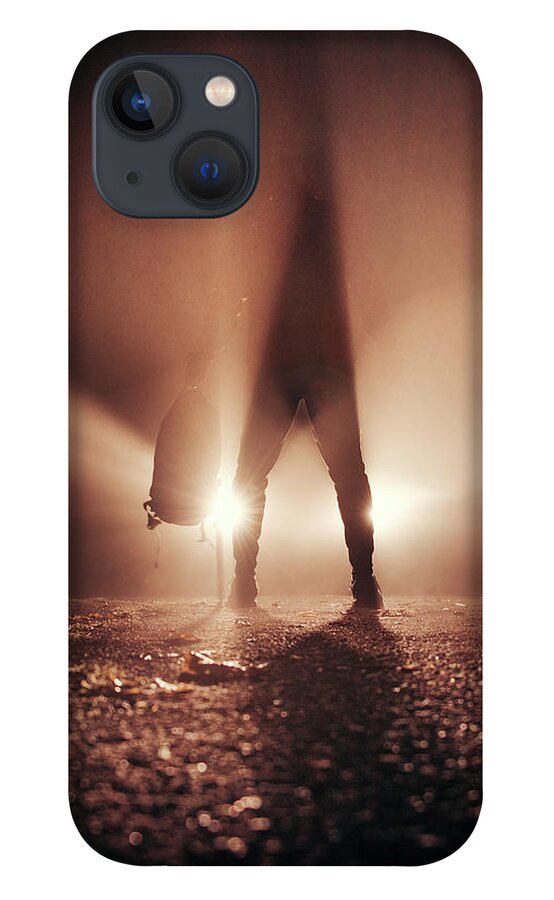 Figure iPhone 13 Case featuring the photograph Man stands in car lights by Vaclav Sonnek