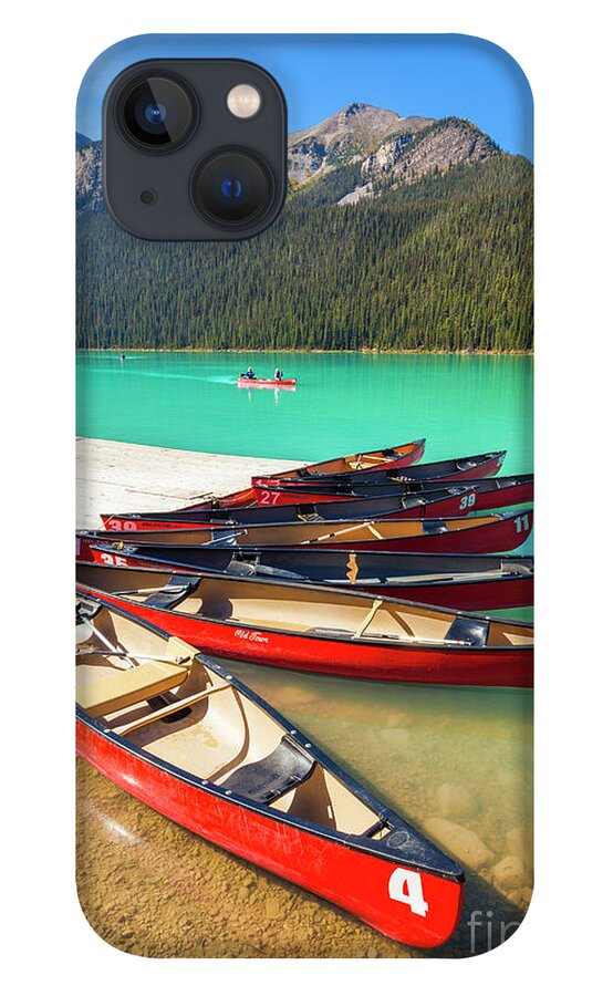 Red Canoes iPhone 13 Case featuring the photograph Red Canoes on Lake Louise, Banff national Park, Alberta, Canada by Neale And Judith Clark