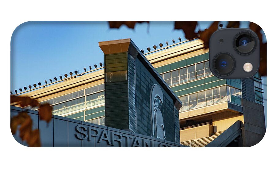 Michigan State Football iPhone 13 Case featuring the photograph Spartan Stadium north end zone through the trees by Eldon McGraw