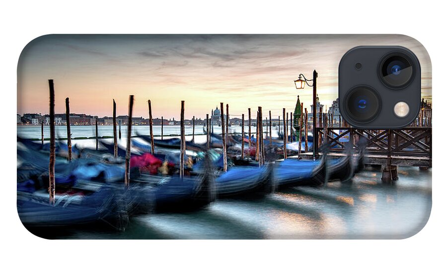 Gondola iPhone 13 Case featuring the photograph Venice Gondolas moored at the San Marco square. by Michalakis Ppalis