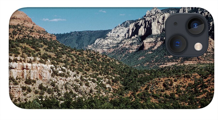 https://render.fineartamerica.com/images/rendered/default/phone-case/iphone13mini/images/artworkimages/medium/2/mountains-in-arizonas-landscape-oak-creek-canyon-ariz400-00206-kevin-russell.jpg?&targetx=0&targety=-23&imagewidth=1835&imageheight=1128&modelwidth=1835&modelheight=1065&backgroundcolor=4C96AF&orientation=1
