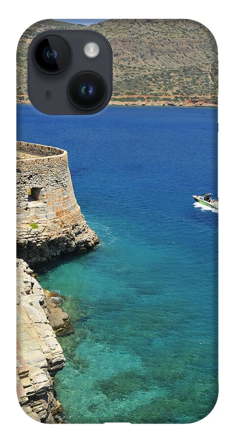 Ocean iPhone 14 Case featuring the photograph Blue water and boat - Spinalonga Island Crete Greece by Matthias Hauser