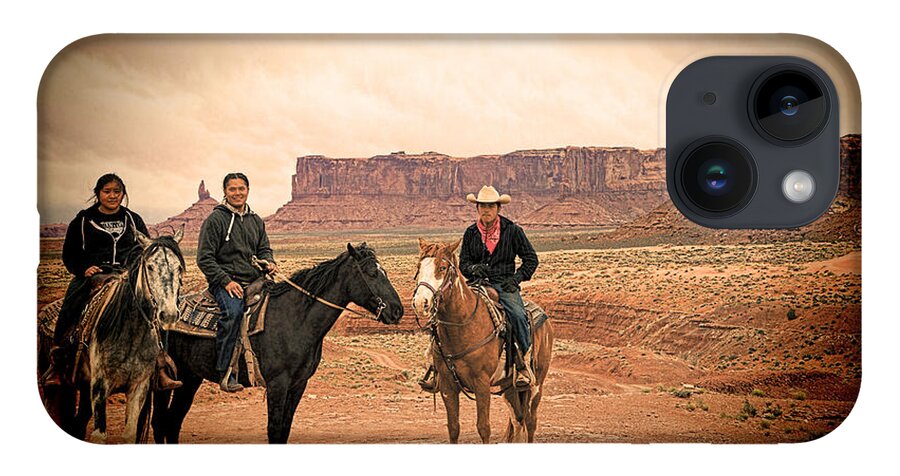 Red Soil iPhone 14 Case featuring the photograph Navajo Riders by Jim Garrison