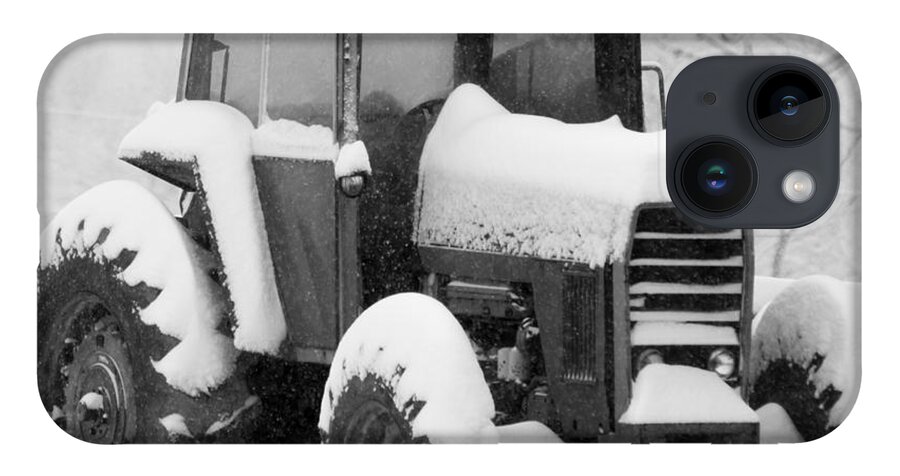 Snow iPhone Case featuring the photograph Old Tractor in the Snow by Holden The Moment