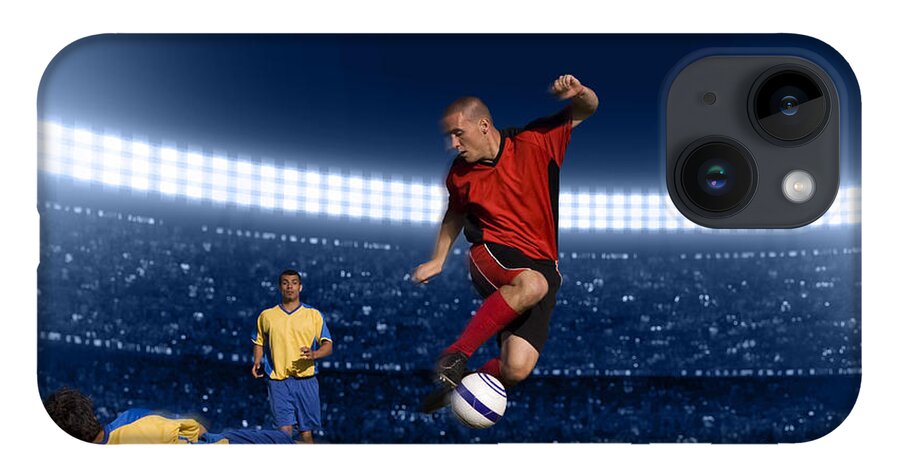Expertise iPhone 14 Case featuring the photograph Soccer Player Jumping With Ball by Kycstudio