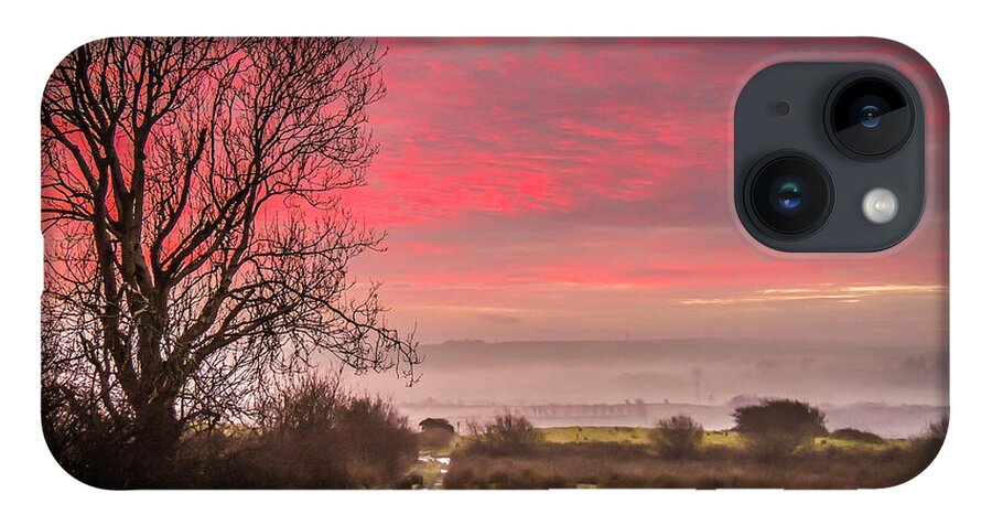 Ireland iPhone 14 Case featuring the photograph Sunrise over Decomade Pasture in County Clare by James Truett