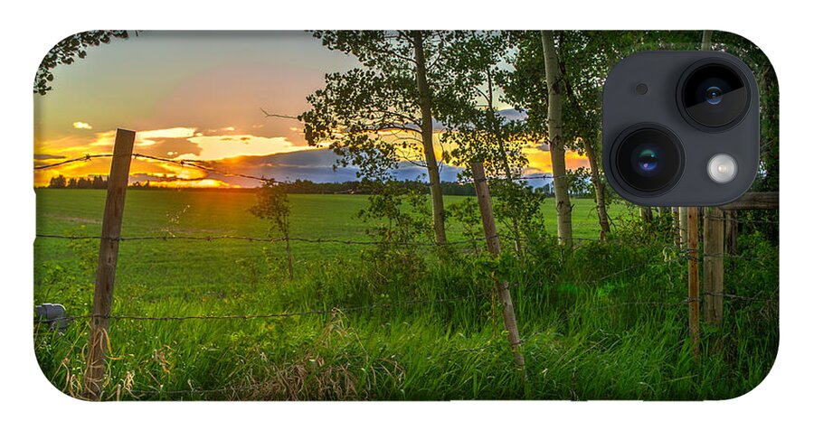 Sunset iPhone 14 Case featuring the photograph Sunset over farmers field by Thomas Nay