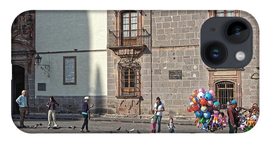 Balloon iPhone 14 Case featuring the photograph Balloon seller, San Miguel 2014 by Chris Honeyman