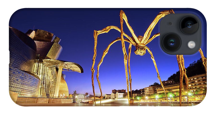 Guggenheim iPhone 14 Case featuring the photograph Guggenheim museum and spider at night in Bilbao by Mikel Martinez de Osaba