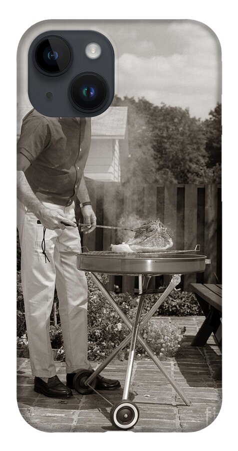 1960s iPhone 14 Case featuring the photograph Man Grilling In Backyard, C.1960s by H. Armstrong Roberts/ClassicStock