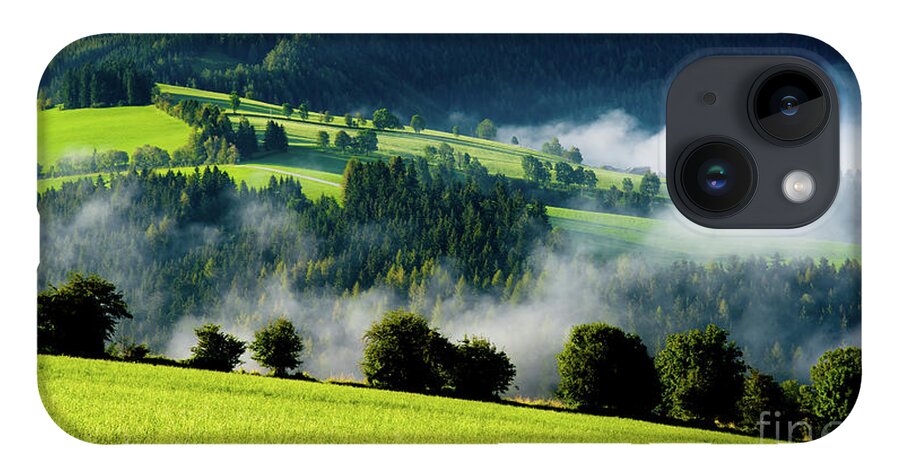 Austria iPhone Case featuring the photograph Misty valley in Austria by Andreas Berthold