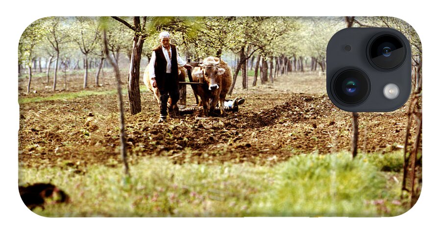 Agriculture iPhone 14 Case featuring the photograph Ploughing in the orchard by Emanuel Tanjala