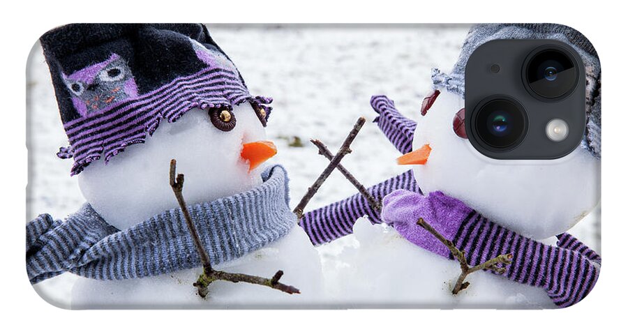 Snowmen iPhone 14 Case featuring the photograph Two cute snowmen friends embracing by Simon Bratt
