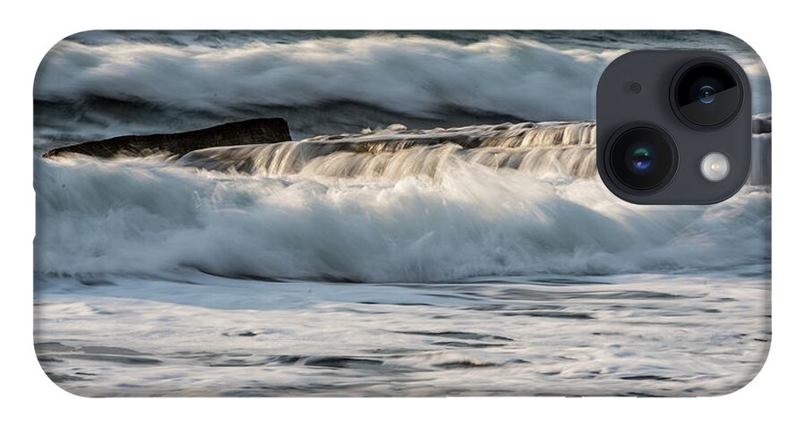 Seascape iPhone 14 Case featuring the photograph Rocky seashore with wavy ocean and waves crashing on the rocks #3 by Michalakis Ppalis
