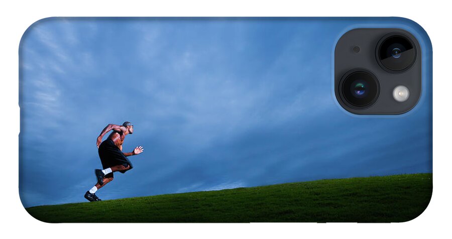 Expertise iPhone 14 Case featuring the photograph Athlete Running Up Grassy Hill by Johnnyhetfield