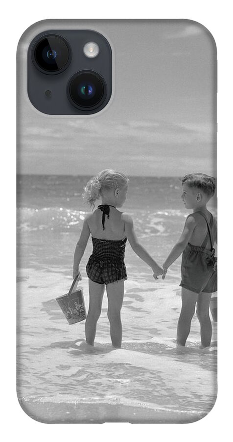Water's Edge iPhone Case featuring the photograph Boy And Girl Standing On Beach, Holding by H. Armstrong Roberts