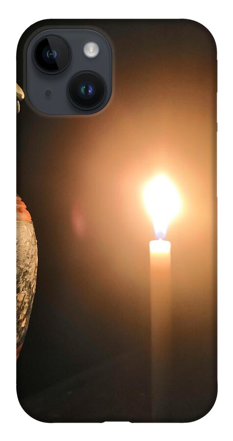 Candle Light iPhone Case featuring the photograph Light in the dark by Ian Batanda