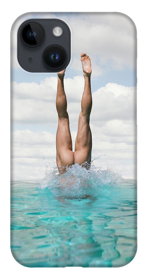 Diving Into Water iPhone Case featuring the photograph Nude Man Diving by Ed Freeman