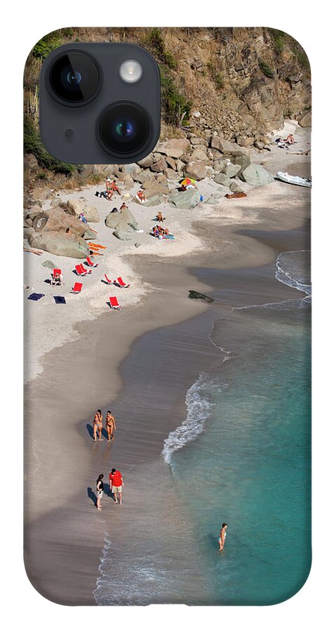 Water's Edge iPhone 14 Case featuring the photograph People Relax On Shell Beach by Holger Leue