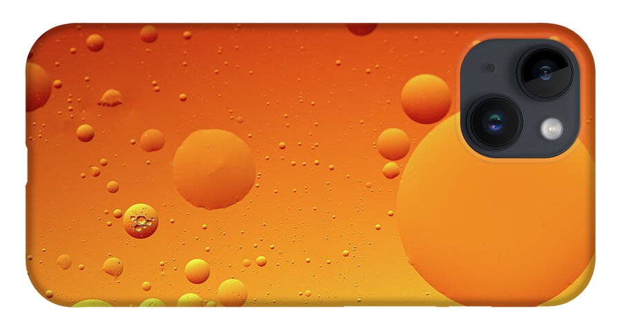 Connection iPhone Case featuring the photograph Bright abstract, yellow background with flying bubbles by Michalakis Ppalis