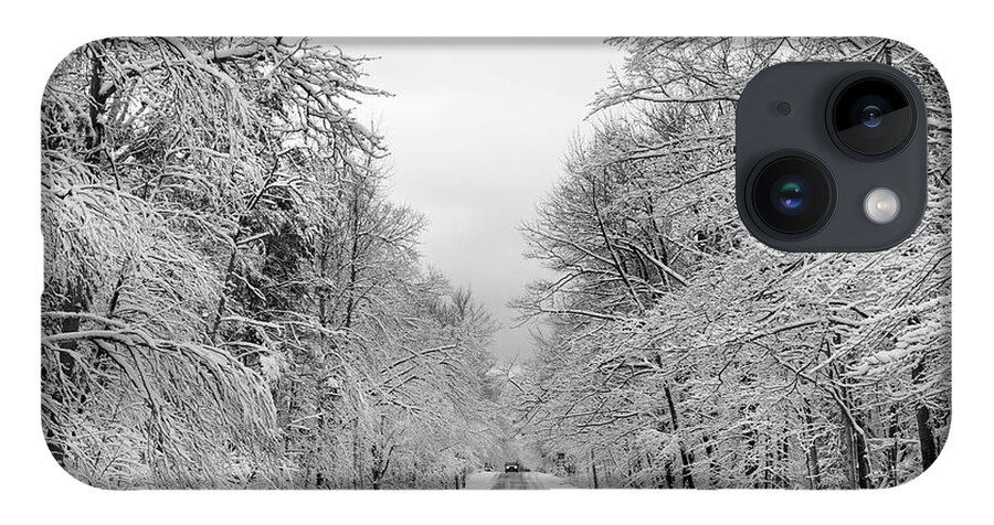 Back Road iPhone Case featuring the photograph Traveling Through the Fresh Snow by David T Wilkinson