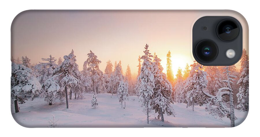 Rovaniemi iPhone 14 Case featuring the photograph Orange rays of the sun illuminate the frosty and snowy Finnish scenery #1 by Vaclav Sonnek