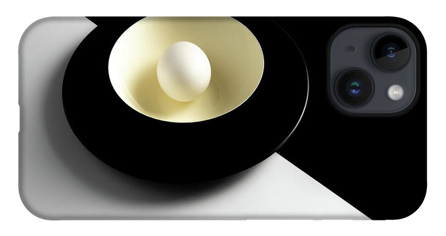 Still-life iPhone 14 Case featuring the photograph Single fresh white egg on a yellow bowl by Michalakis Ppalis