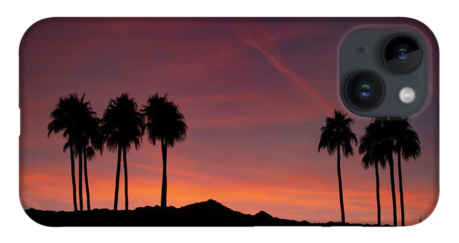 Afterglow iPhone 14 Case featuring the photograph 10 Palm Silhouettes at Sunset Palm Desert California by Bonnie Colgan