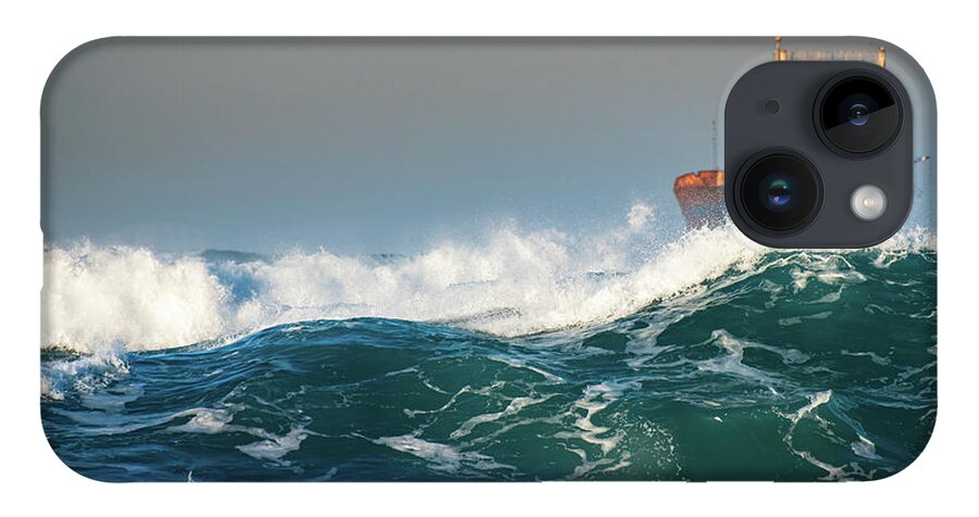 Shipwreck iPhone 14 Case featuring the photograph Abandoned ship in the stormy ocean by Michalakis Ppalis