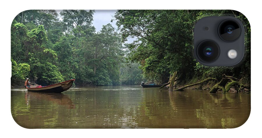 Amazon iPhone 14 Case featuring the photograph Amazonian tropical rainforest environment with calm river and canoe by Henri Leduc