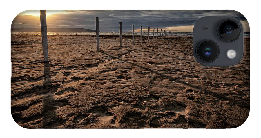 Downhill iPhone 14 Case featuring the photograph Benone Beach Posts by Nigel R Bell
