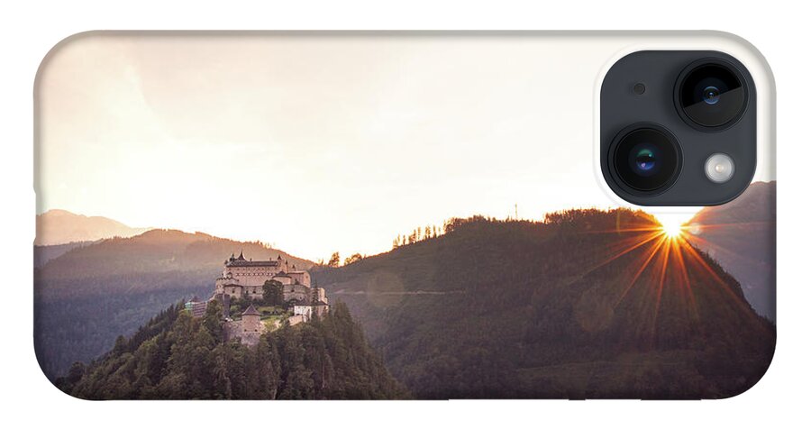 Reconstruction iPhone 14 Case featuring the photograph Hohenwerfen Castle at sunset by Vaclav Sonnek