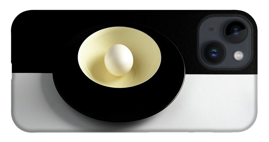 Still-life iPhone Case featuring the photograph Single fresh white egg on a yellow bowl by Michalakis Ppalis