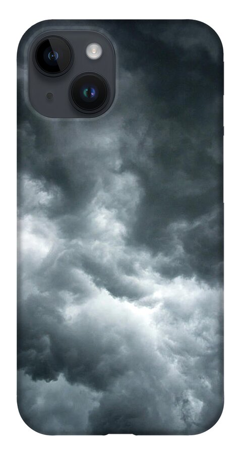 Clouds iPhone 14 Case featuring the photograph Stormy clouds in the sky. by Bernhard Schaffer