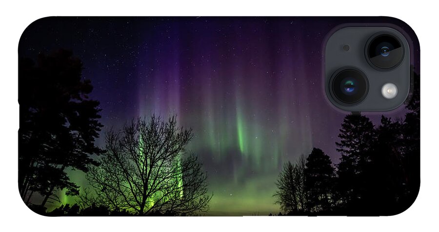 Aurora Borealis iPhone 14 Case featuring the photograph The Northern Lights behind the oak tree with yellow, green, red by Torbjorn Swenelius