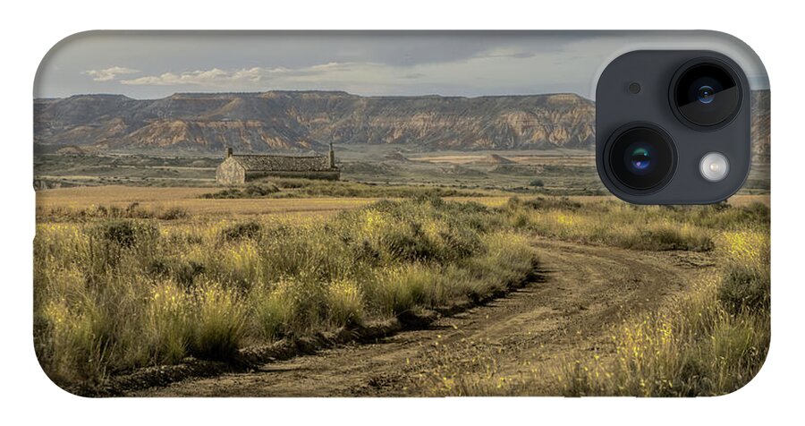 Badlands iPhone 14 Case featuring the photograph The only house in the Bardenas Reales by Micah Offman